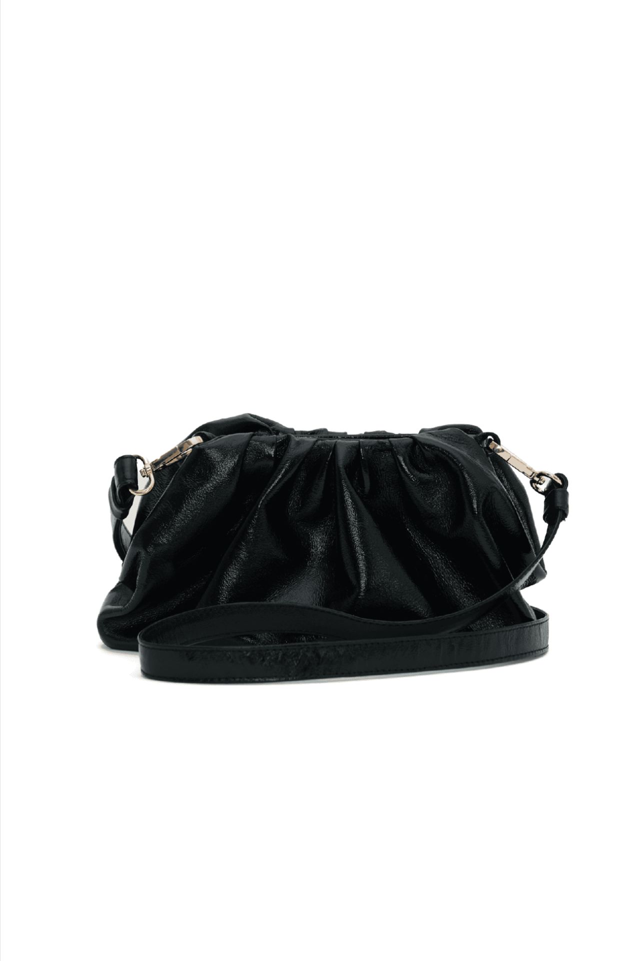 
Nuestra cartera destaca por su estilo sofisticado y funcional. Diseñamos una clutch bag pensada para acompañarte en distintas ocasiones, desde eventos especiales hasta salidas casuales. Incluye un asa removible que te permite llevarla como más te guste.

Disponible en elegantes tonos de charol: marrón, negro , esta pieza añade un toque de brillo y carácter a cualquier look.

Material: Carteras 100% de cuero charol
Medidas: Largo: 20 cm | Alto: 15 cm | Ancho: 6 cm
Hechas a mano por artesanos peruanos


 
